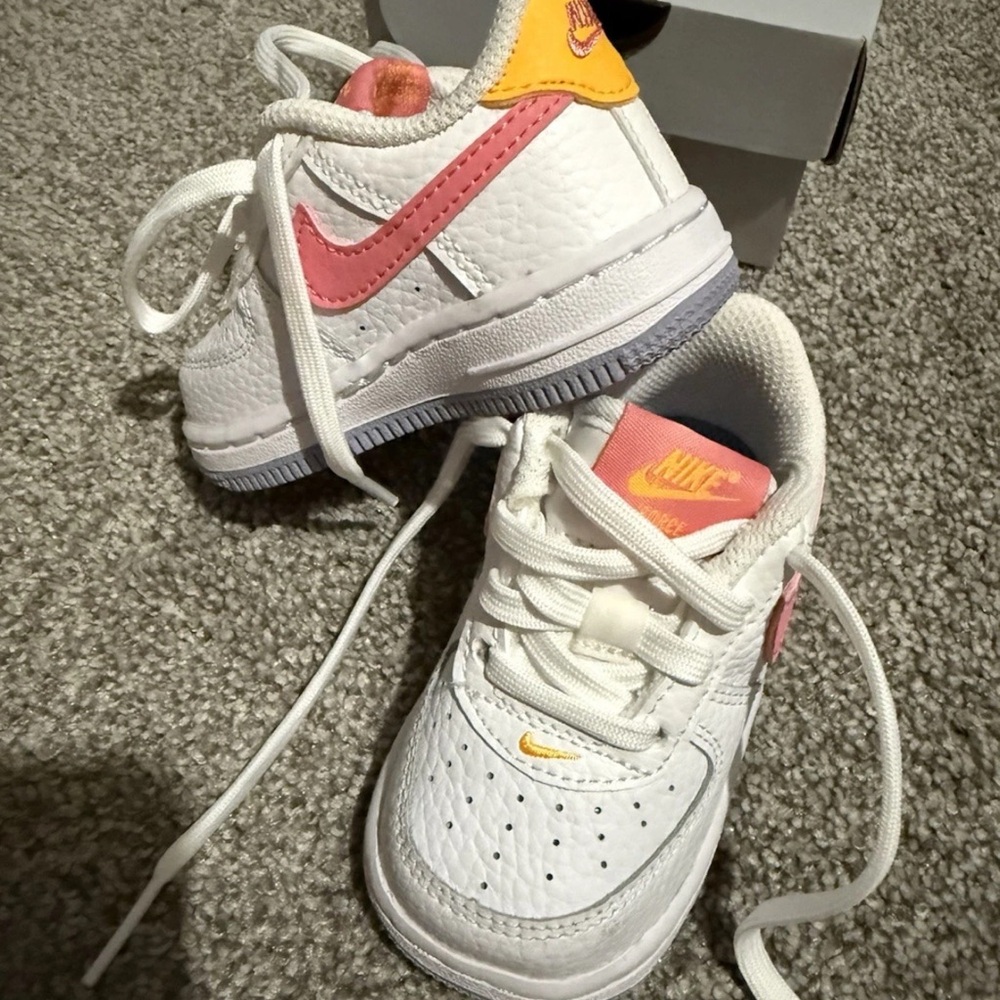 Nike White and Pink Sneakers Iconic Design